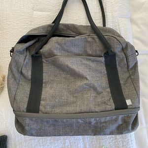Gym bag with shoe compartment & crossbody strap
